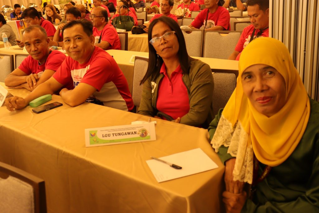 May be an image of 6 people, people studying, dais and text that says "LGU TUNGAWAN TUNGAWAN"